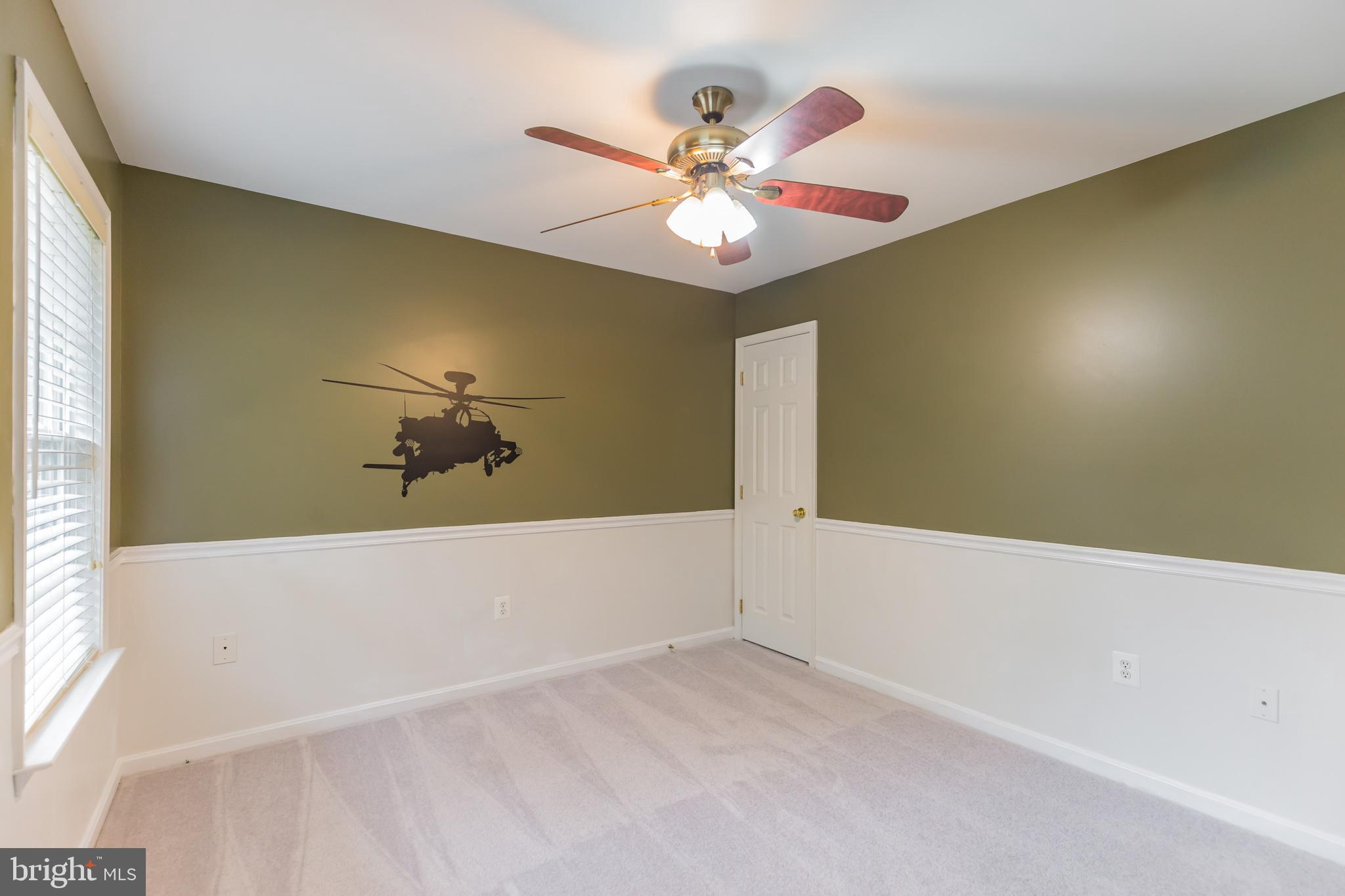 2750 Dalrymple Road Sunderland, MD 20689 - Photo 18 of 28 a view of a bathtub and chandelier fan in a room