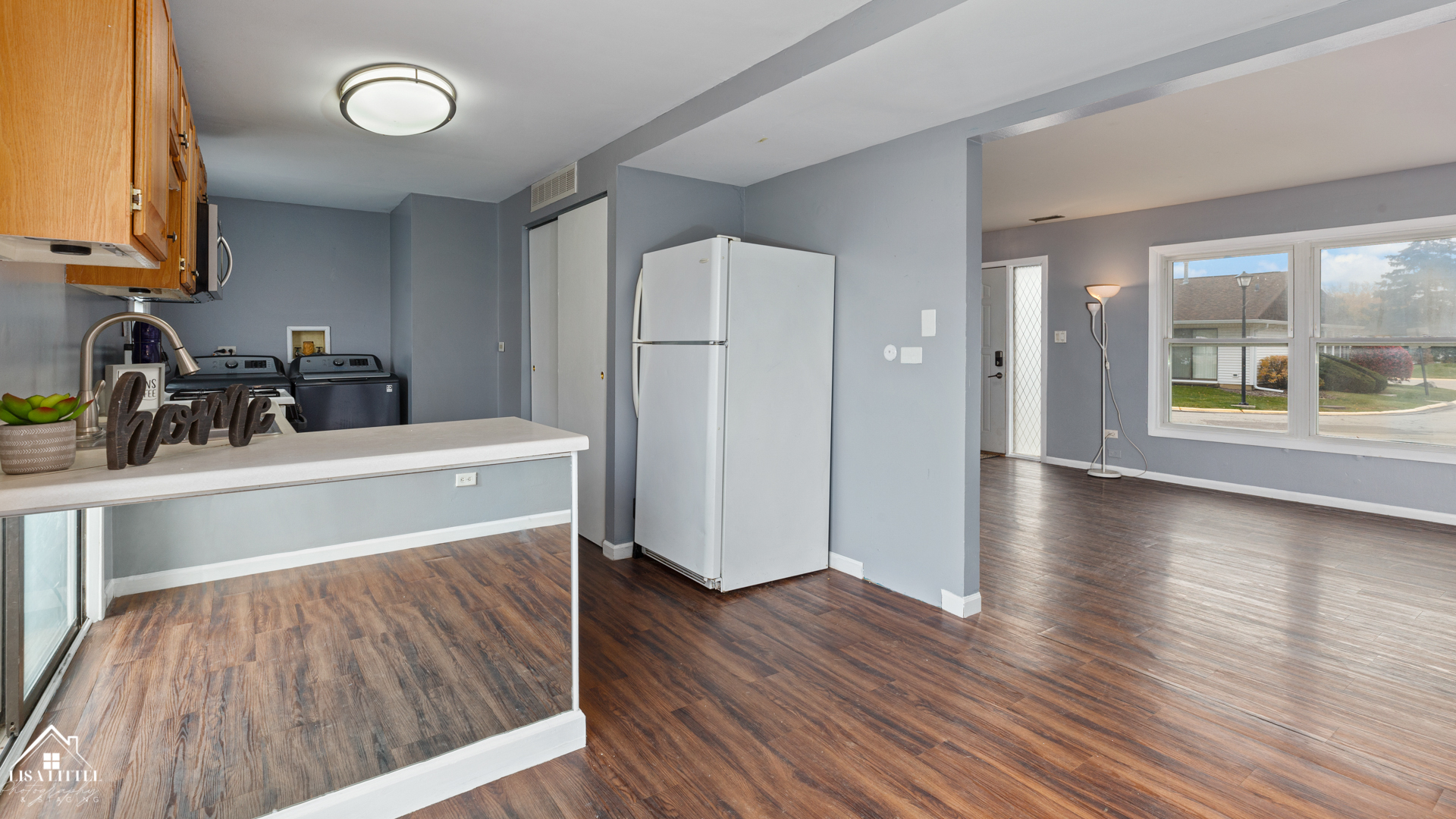 470 Degas Circle Bolingbrook, IL 60440 - Photo 9 of 22 a view of a kitchen with wooden floor and a sink
