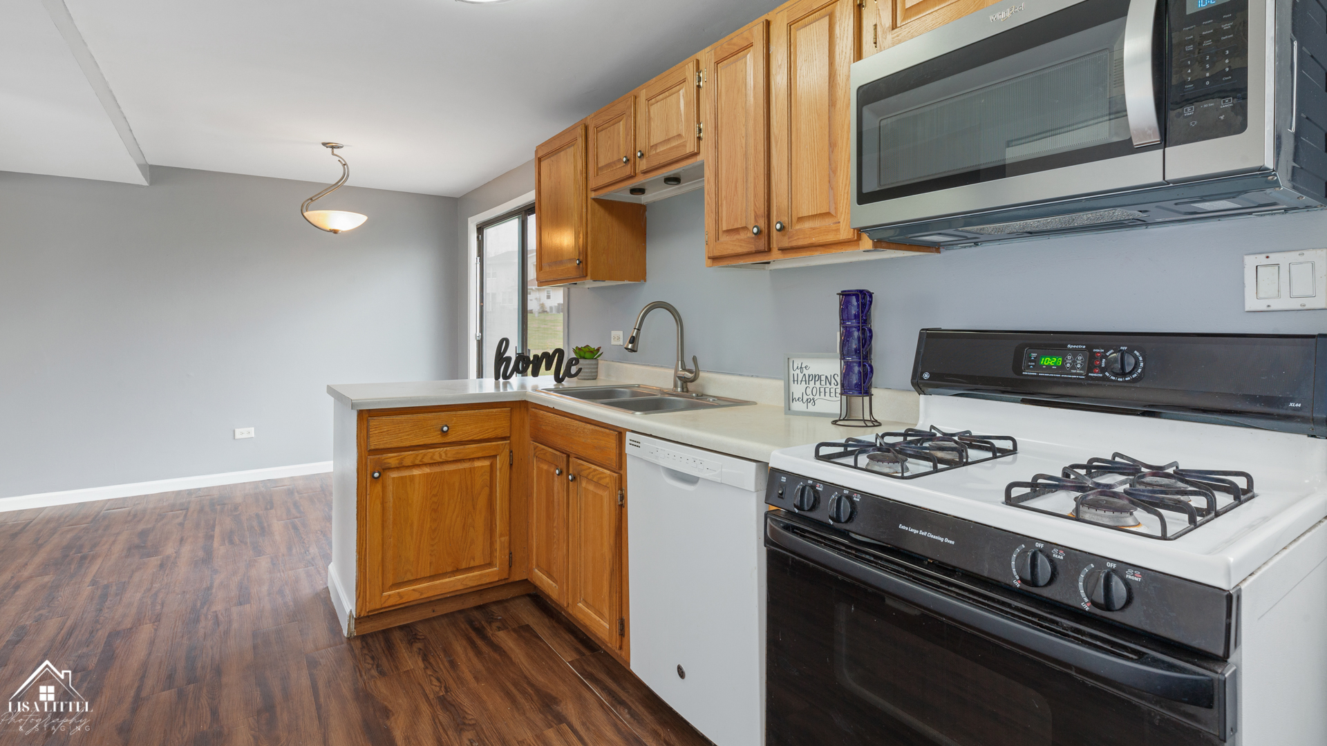 470 Degas Circle Bolingbrook, IL 60440 - Photo 10 of 22 a kitchen with stainless steel appliances a stove a sink and cabinets