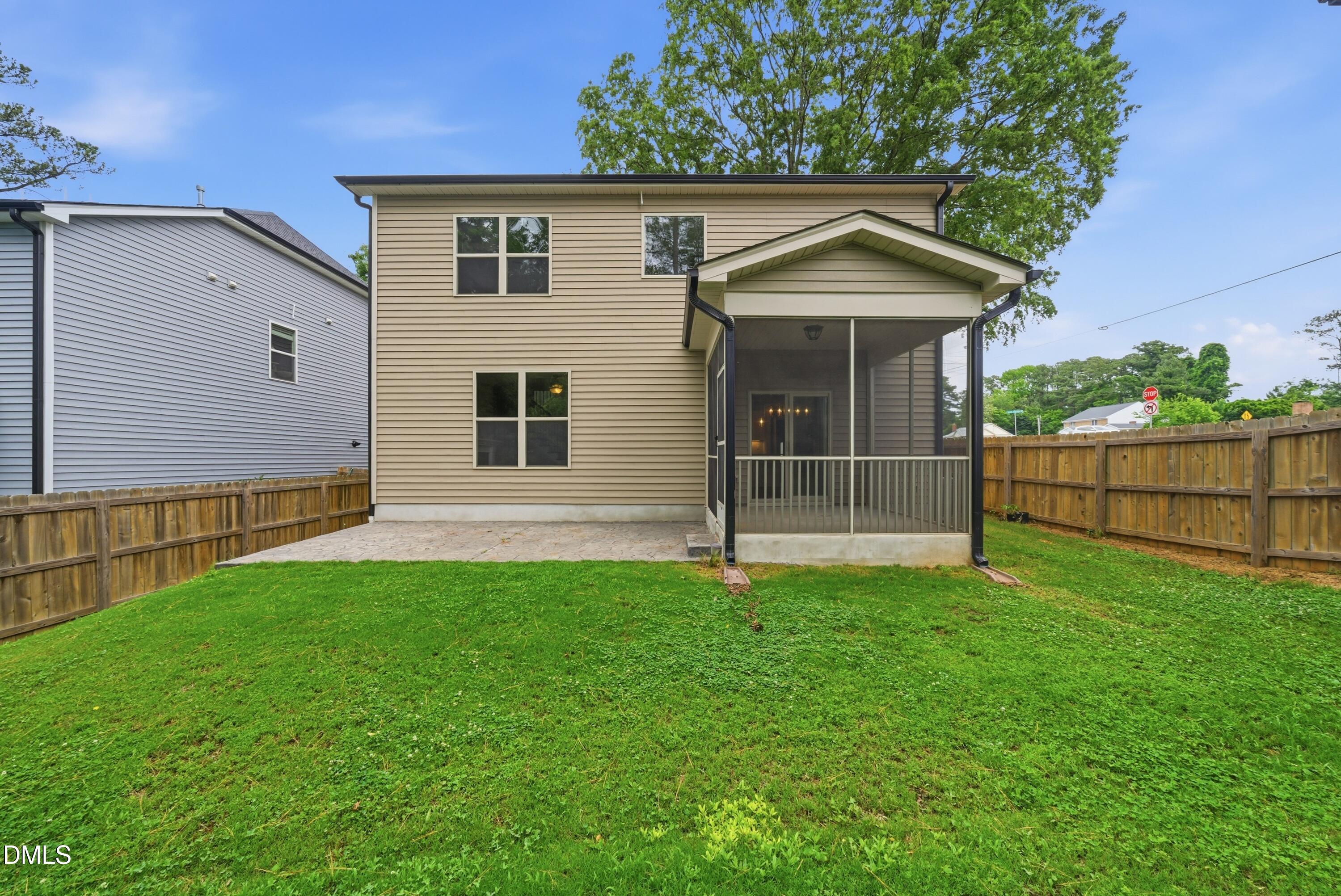 928 Barringer Drive Raleigh, NC 27606 - Photo 31 of 40 a view of a house with backyard and garden