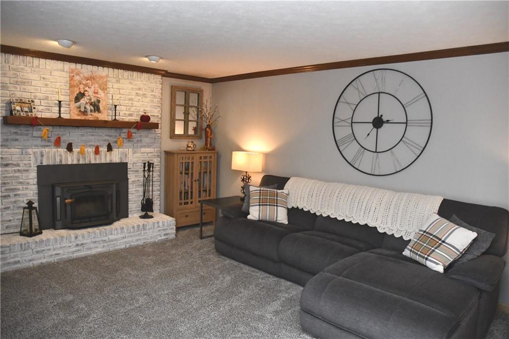 110 Firethorn Road Baden, PA 15005 - Photo 18 of 43 a living room with furniture and a fireplace