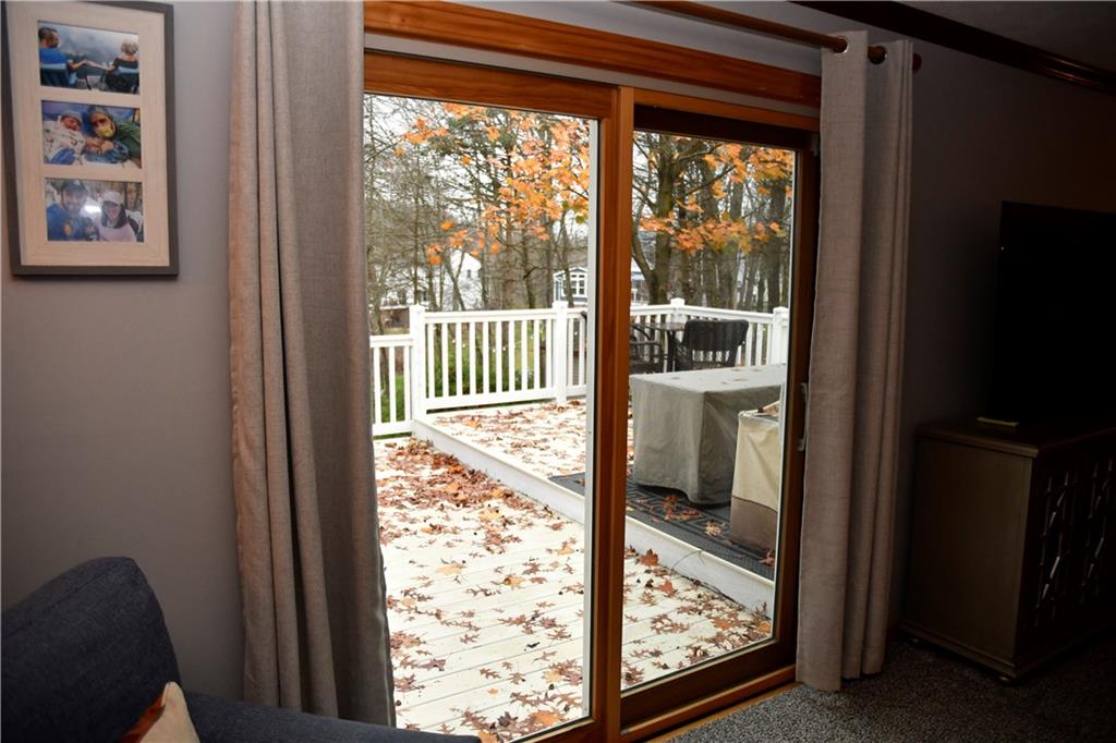 110 Firethorn Road Baden, PA 15005 - Photo 41 of 43 a view of a porch and wooden floor