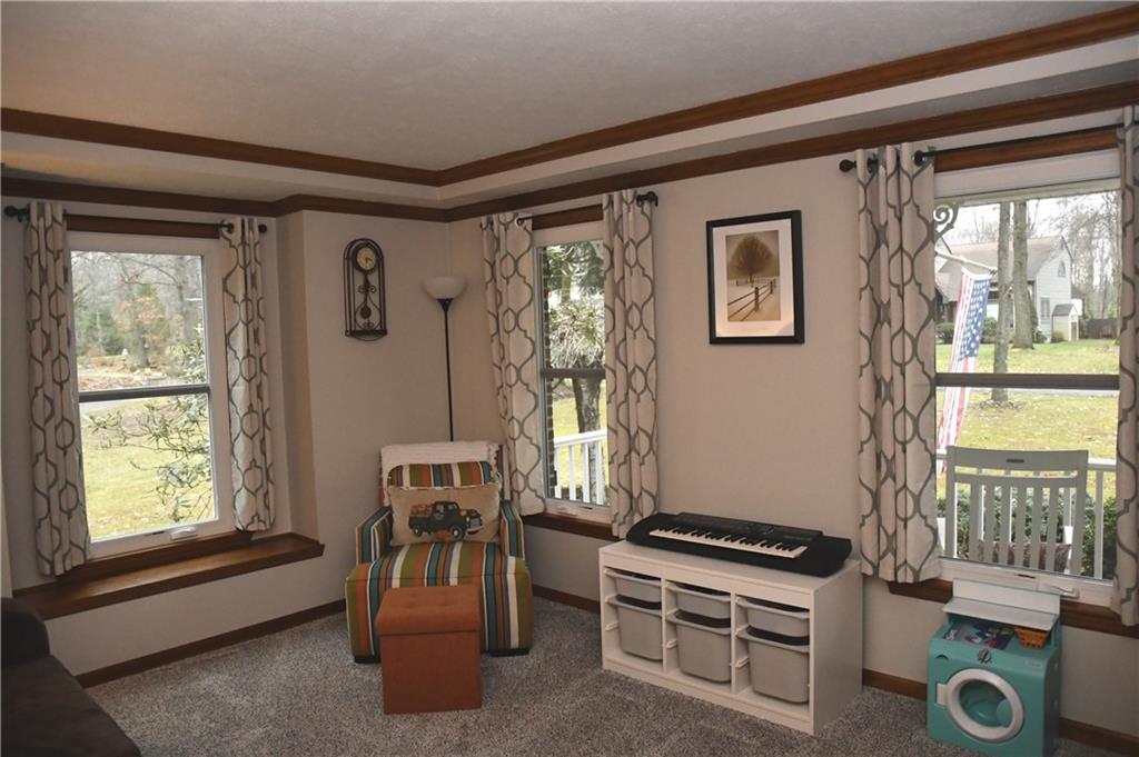 110 Firethorn Road Baden, PA 15005 - Photo 8 of 43 a room with furniture and windows
