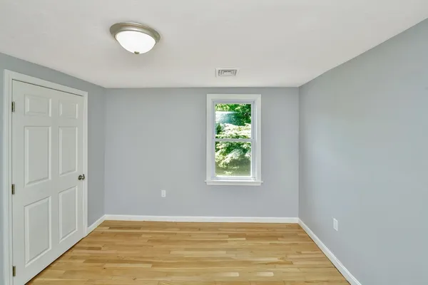 an empty room with window