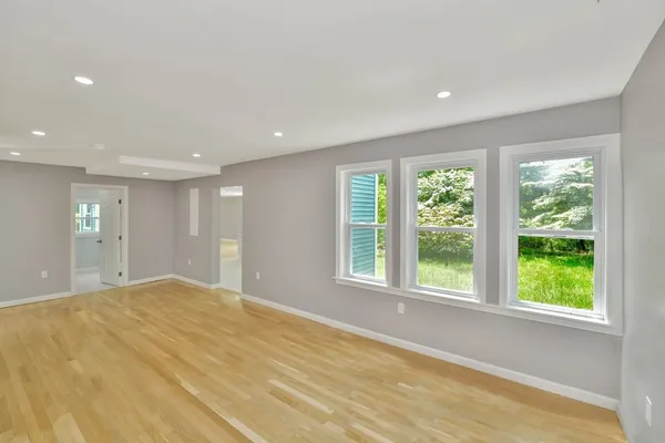 a view of an empty room with a window