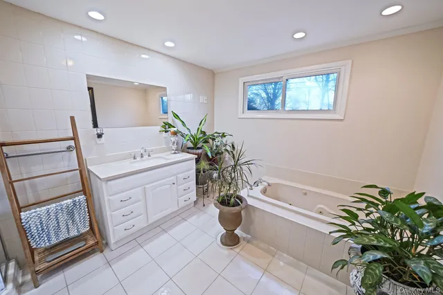 a bathroom with a sink and a bathtub