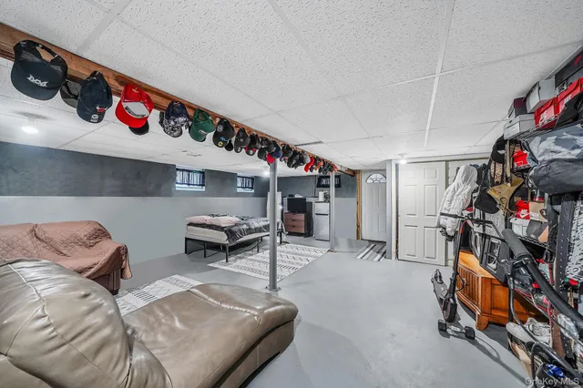 a view of livingroom with furniture and toys