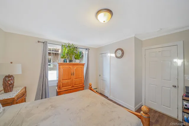 a view of a livingroom with furniture and windows