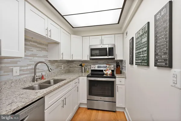 $395,000 | 7651 Tremayne Place, Unit 211, McLean, VA 22102
