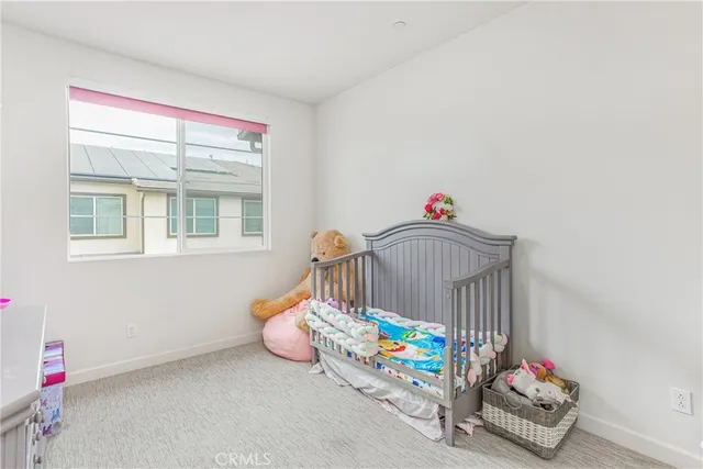 a room with toys and a wooden floor