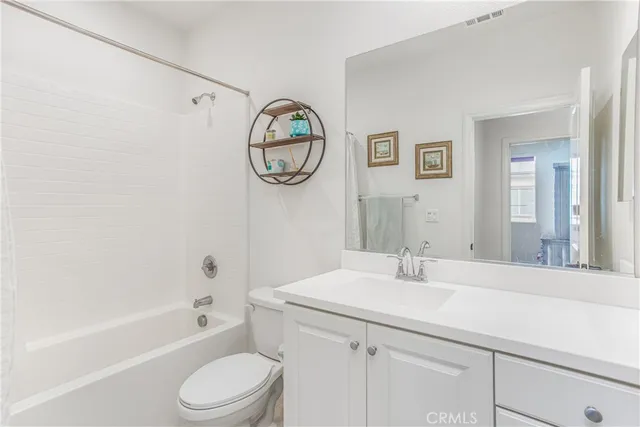 a bathroom with a sink toilet and a bathtub