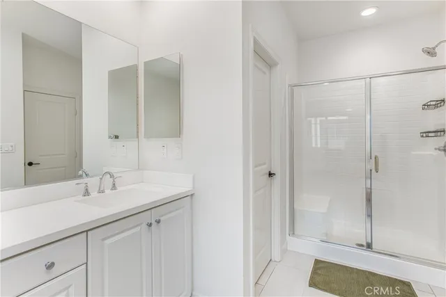 a bathroom with a sink and a shower