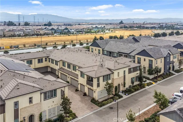 a aerial view of a residential apartment building with a ocean view