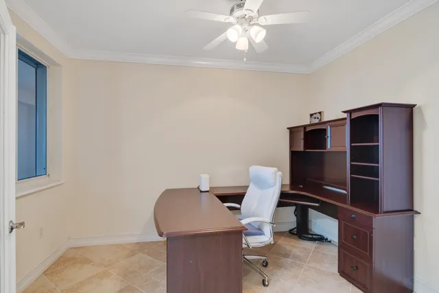 a view of a city street next to a building