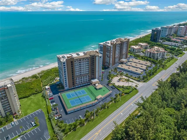 a view of an swimming pool with an outdoor seating