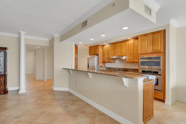 a view of a balcony with furniture