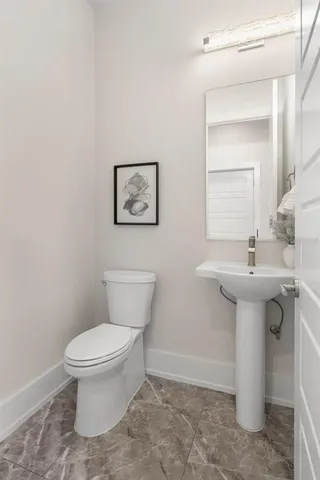 a view of a house with swimming pool next to a yard