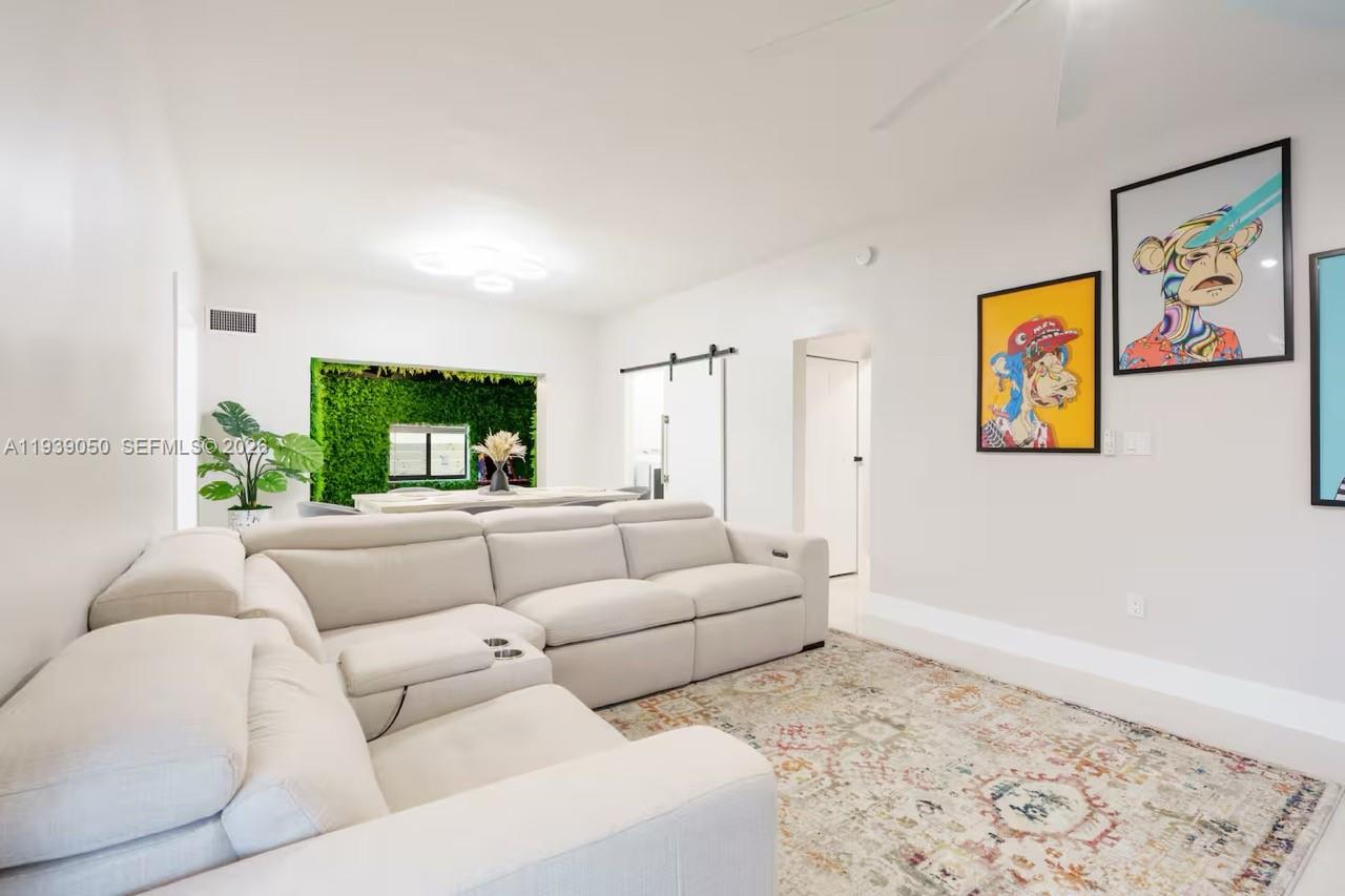 1721 Southwest 11th Terrace Miami, FL 33135 - Photo 12 of 60 a living room with furniture and a couch