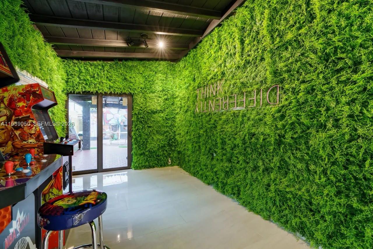 1721 Southwest 11th Terrace Miami, FL 33135 - Photo 15 of 60 a backyard of a house with fountain table and chairs