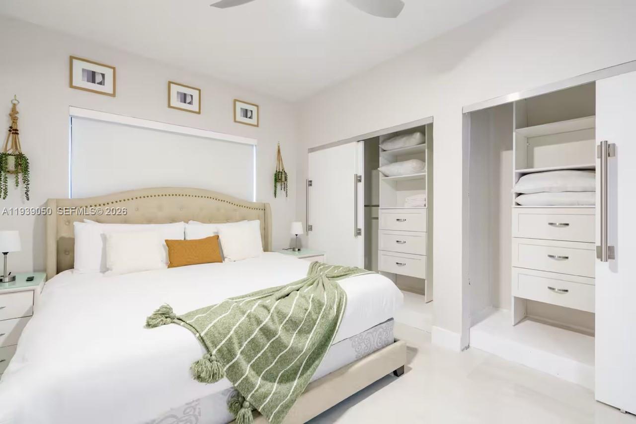 1721 Southwest 11th Terrace Miami, FL 33135 - Photo 20 of 60 a bedroom with a bed and a closet
