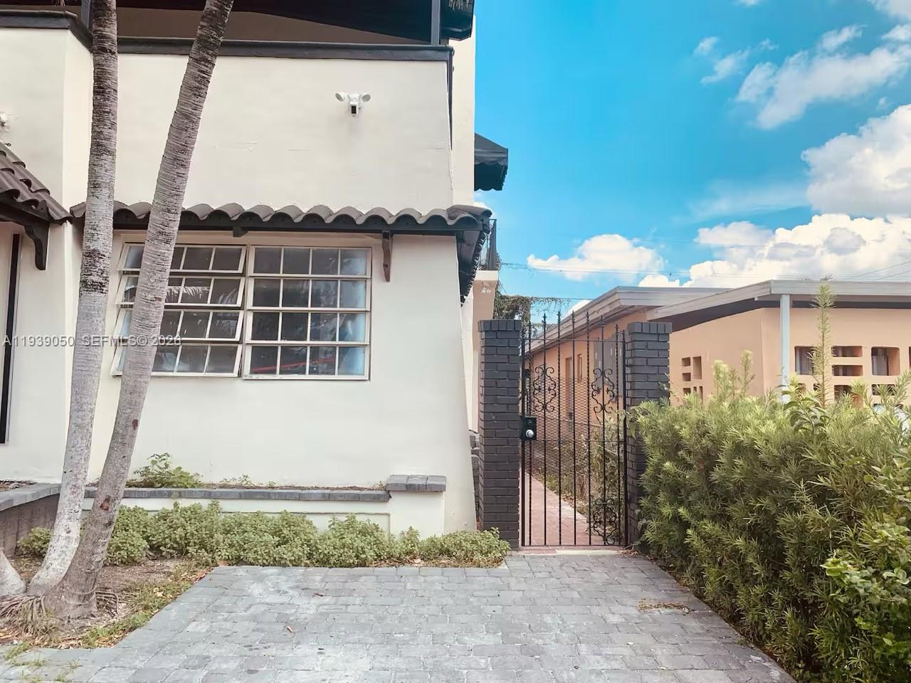 1721 Southwest 11th Terrace Miami, FL 33135 - Photo 48 of 60 a front view of a house with garden