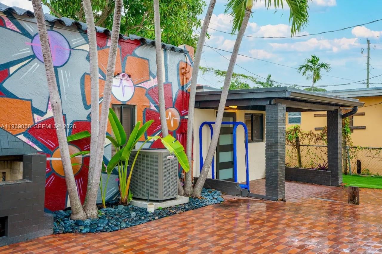 1721 Southwest 11th Terrace Miami, FL 33135 - Photo 49 of 60 a front view of multi story residential apartment building with entryway