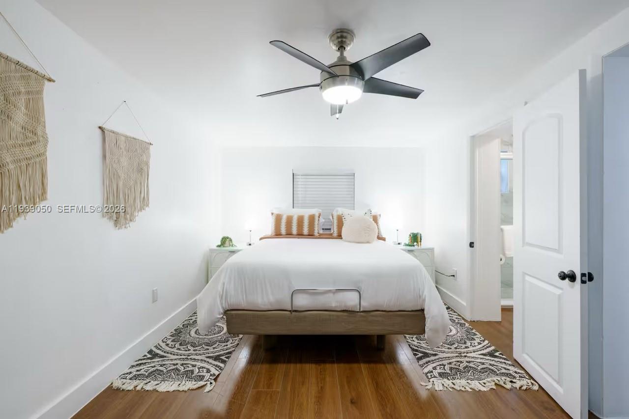 1721 Southwest 11th Terrace Miami, FL 33135 - Photo 55 of 60 a bedroom with a bed and a window