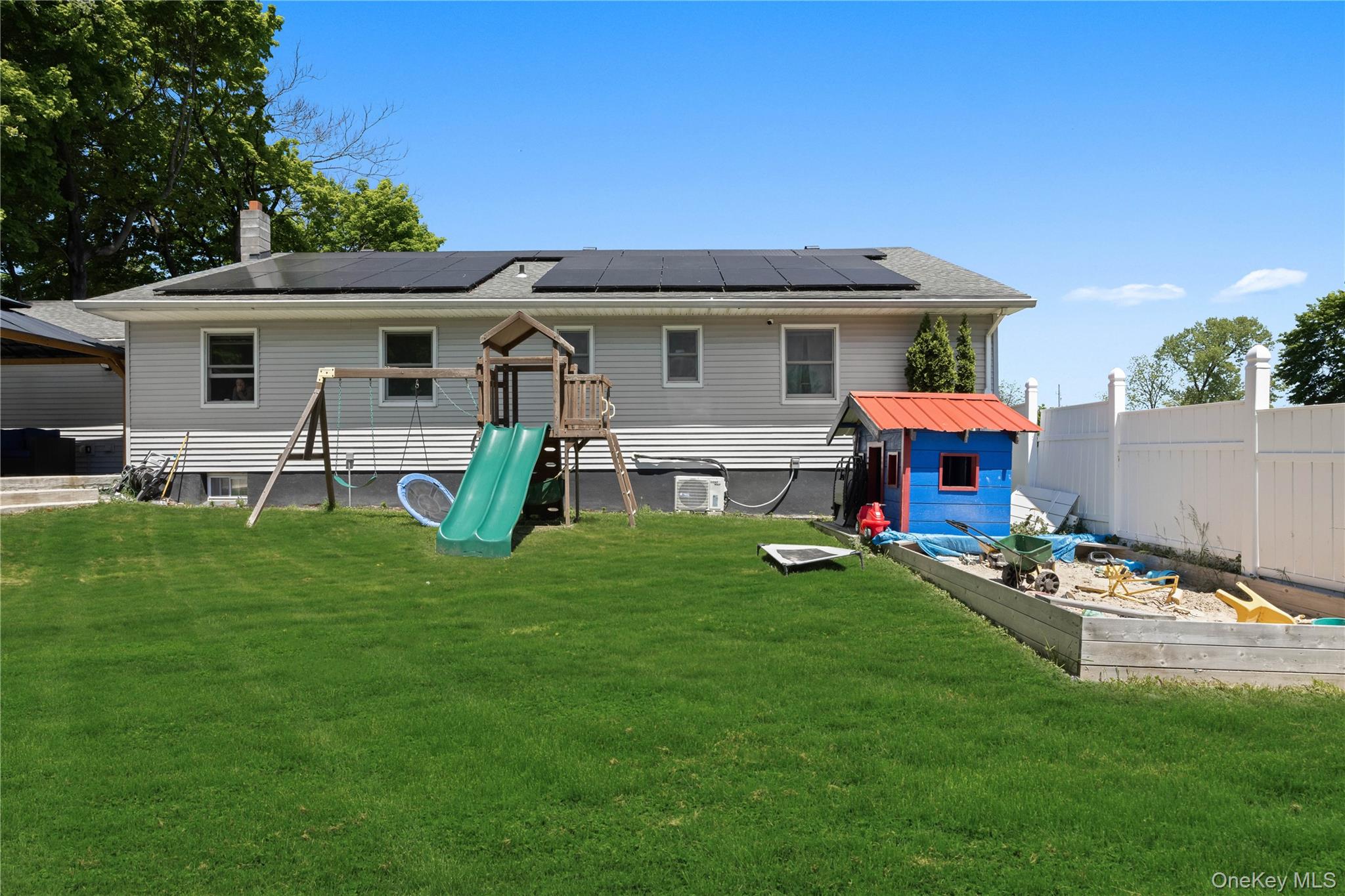 69 Silver Spring Road New Windsor, NY 12553 - Photo 20 of 20 a front view of house with yard and outdoor seating