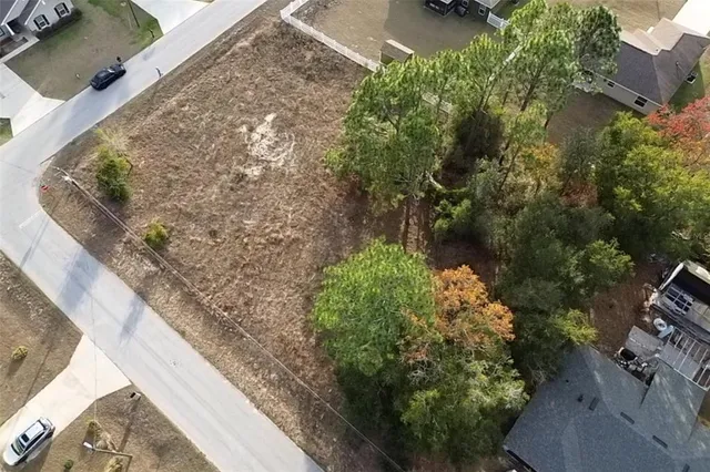a view of open space with yard