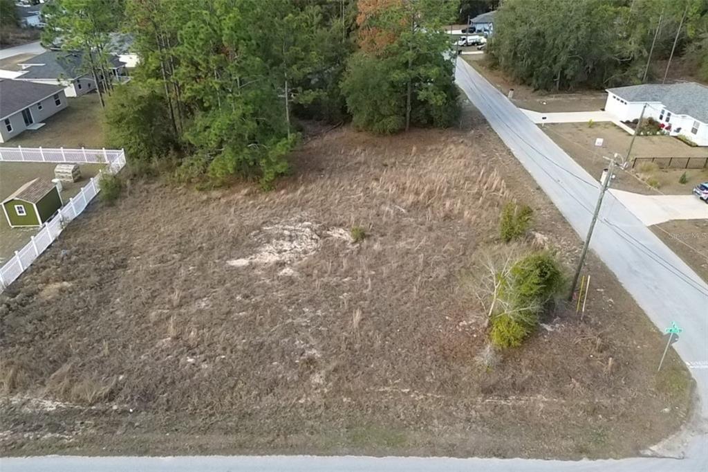 0 Southeast 159th Street Summerfield, FL 34491 - Photo 8 of 22 a view of a yard with an outdoor space