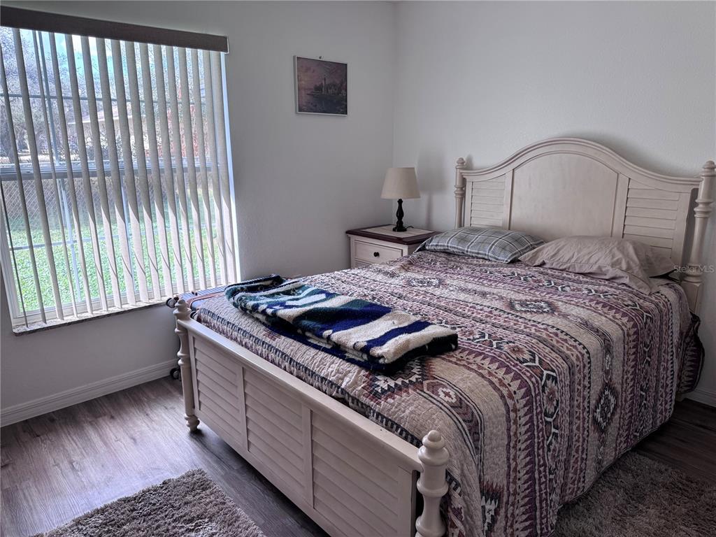 1855 North Berkley Road Avon Park, FL 33825 - Photo 18 of 28 a bedroom with a bed and a window