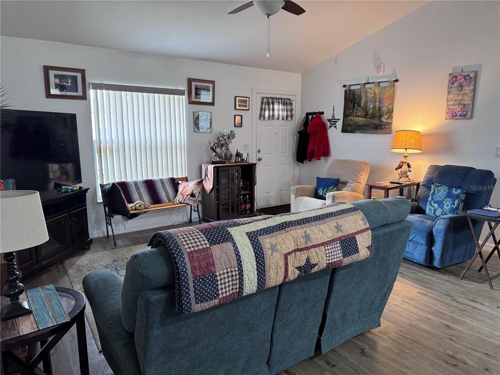 1855 North Berkley Road Avon Park, FL 33825 - Photo 5 of 28 a living room with furniture and a flat screen tv