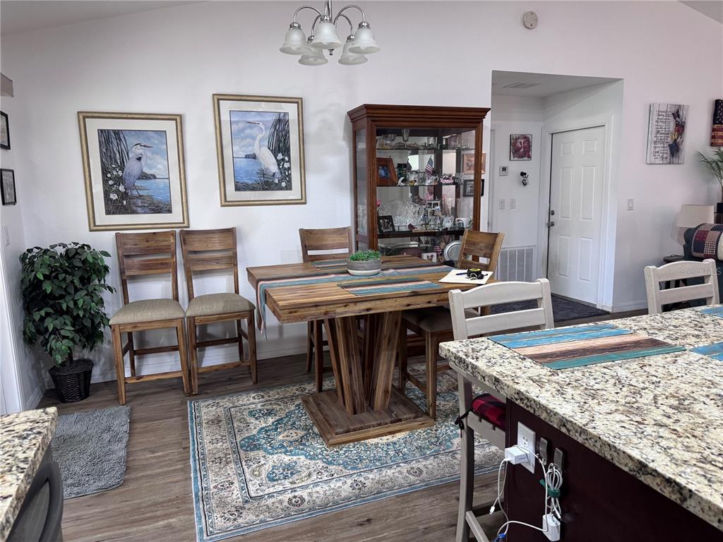 1855 North Berkley Road Avon Park, FL 33825 - Photo 9 of 28 a view of a dining room with furniture