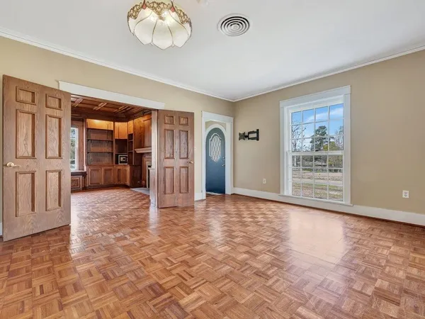 a view of an empty room with a window