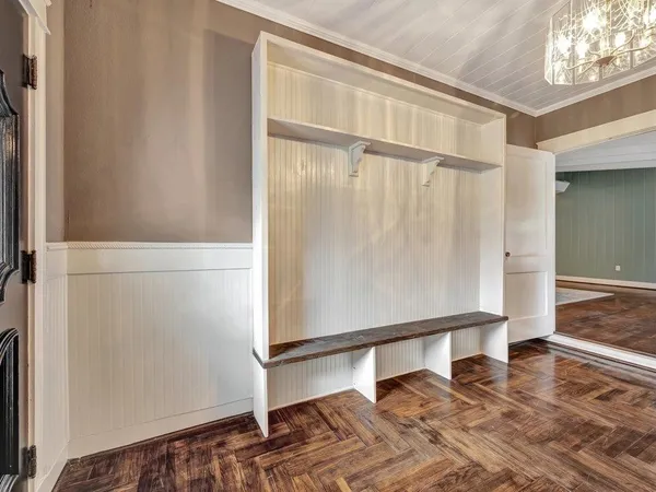 a view of entryway with wooden floor