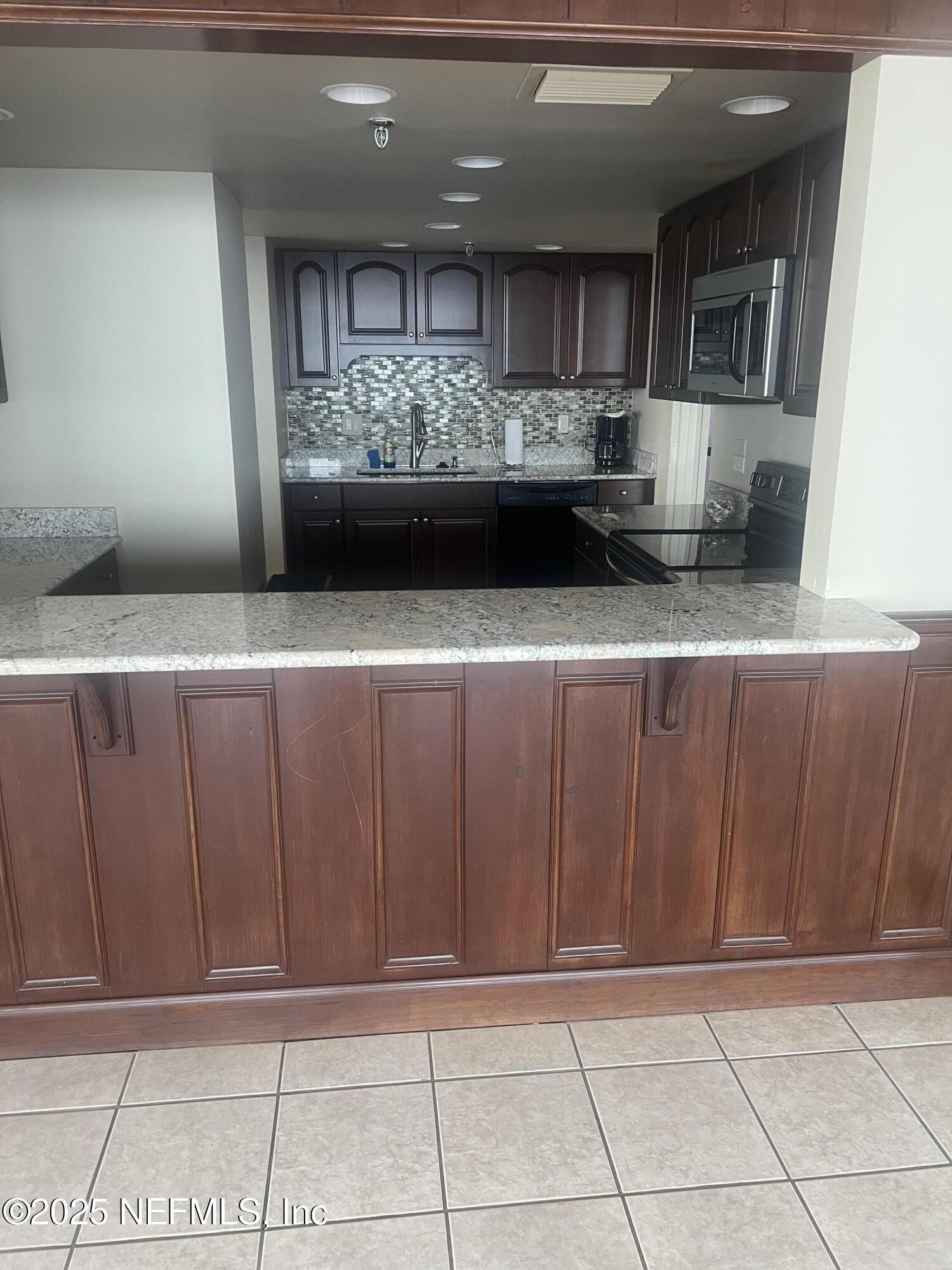 1513 Ocean Shore Boulevard, Unit 4B Ormond Beach, FL 32176 - Photo 2 of 58 IMG_2386