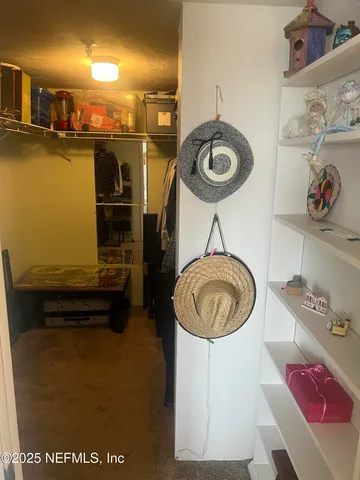 a view of storage and utility room