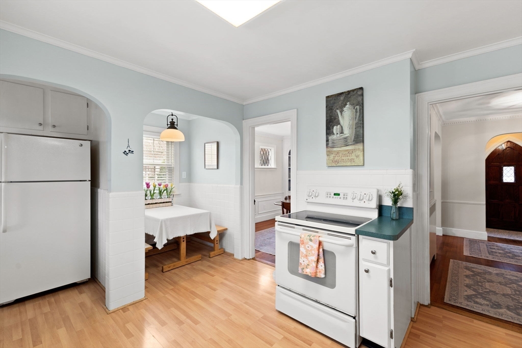 6 Tower Avenue Needham, MA 02494 - Photo 11 of 43 a kitchen with stainless steel appliances a stove a refrigerator and a refrigerator