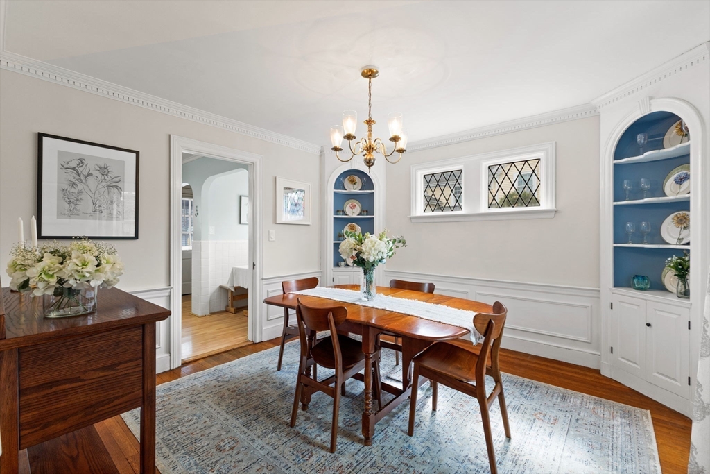6 Tower Avenue Needham, MA 02494 - Photo 16 of 43 a view of a dining room with furniture and chandelier