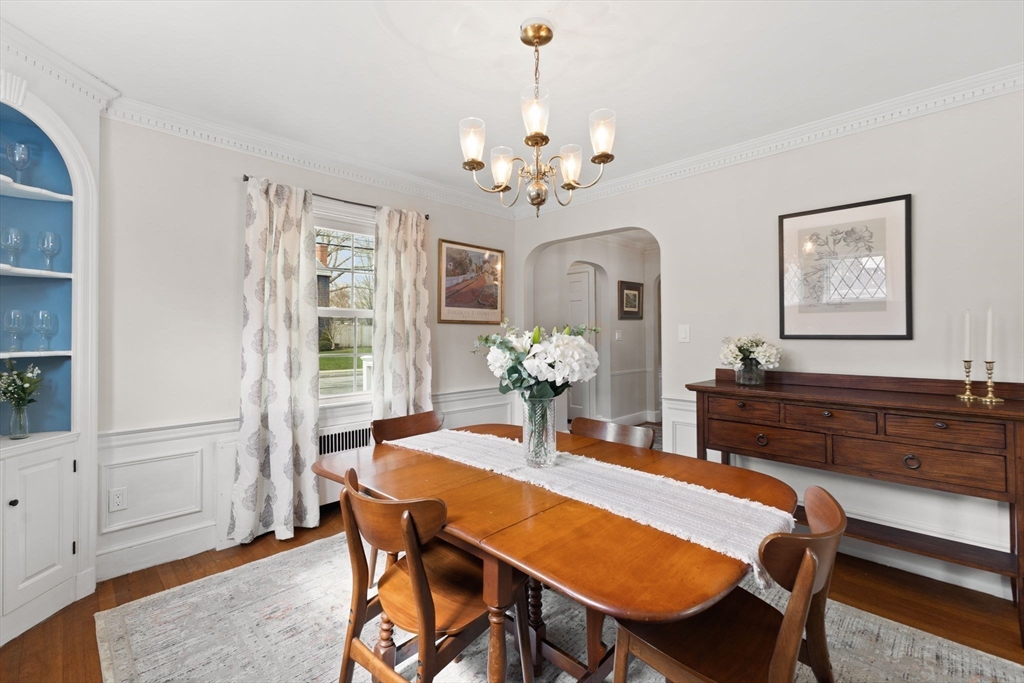 6 Tower Avenue Needham, MA 02494 - Photo 18 of 43 a dining room with furniture and chandelier