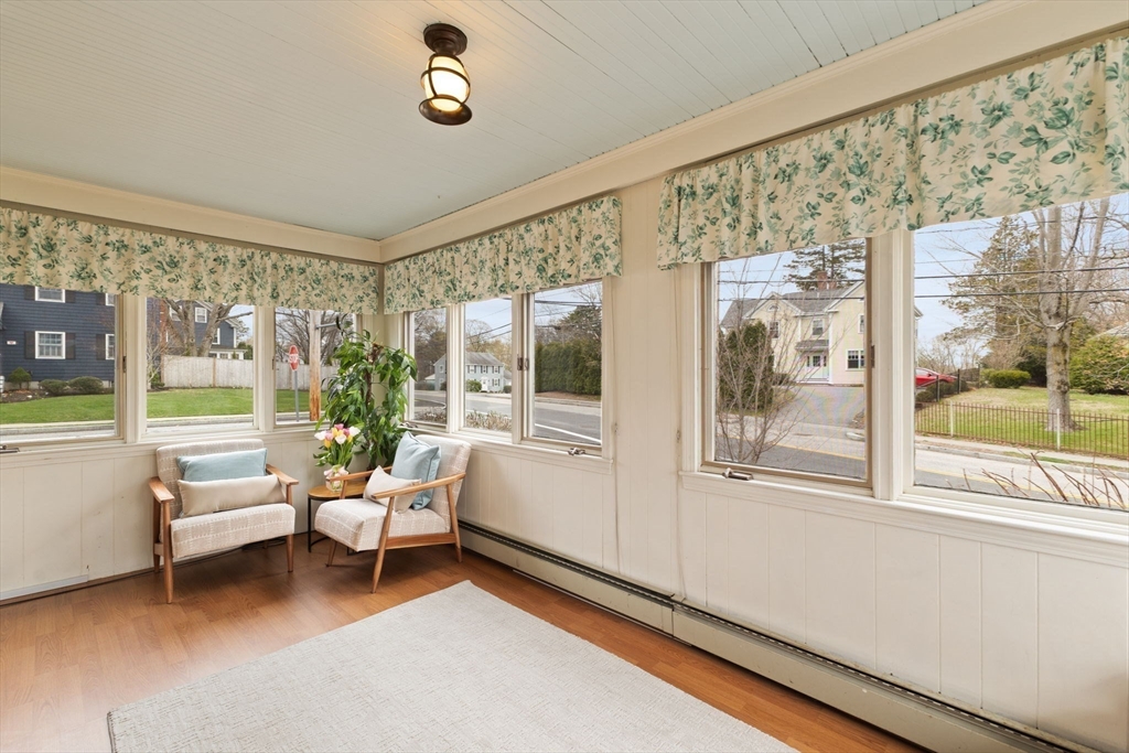 6 Tower Avenue Needham, MA 02494 - Photo 25 of 43 a living room with furniture and a floor to ceiling window