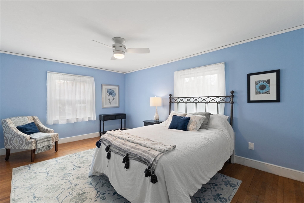 6 Tower Avenue Needham, MA 02494 - Photo 30 of 43 a bedroom with a bed and wooden floor