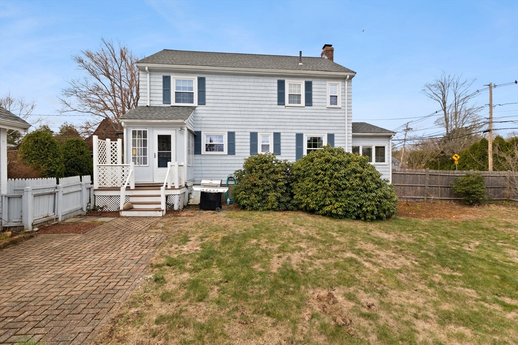 6 Tower Avenue Needham, MA 02494 - Photo 41 of 43 a front view of a house with a yard