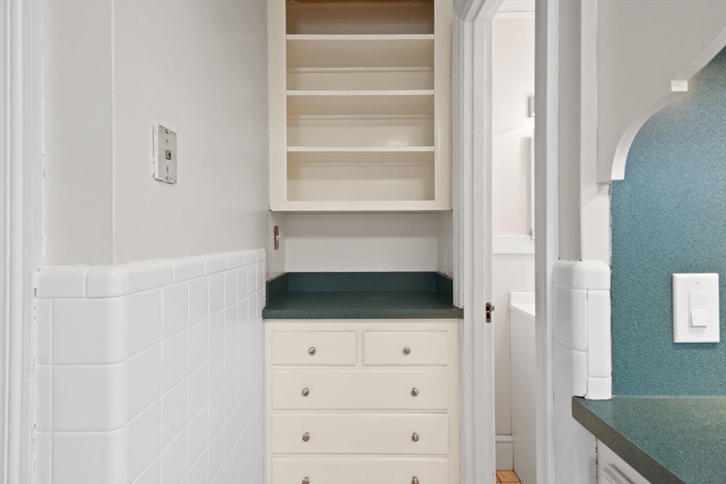 6 Tower Avenue Needham, MA 02494 - Photo 10 of 43 a bathroom with a bathtub and a window