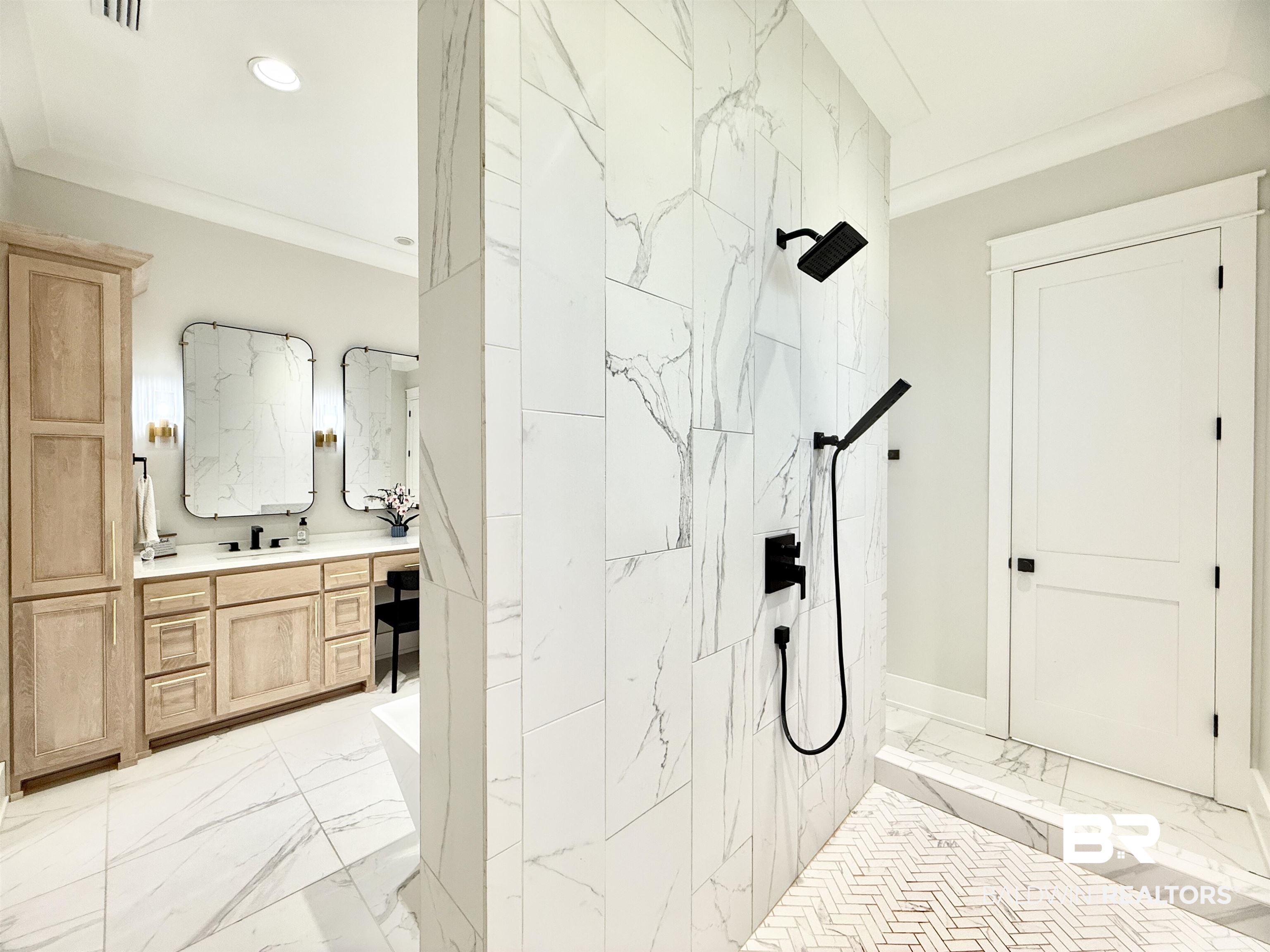 21767 Gallery Boulevard Fairhope, AL 36532 - Photo 34 of 74 Full bath featuring marble finish floors, vanity, crown molding, a walk in shower, and a freestanding tub