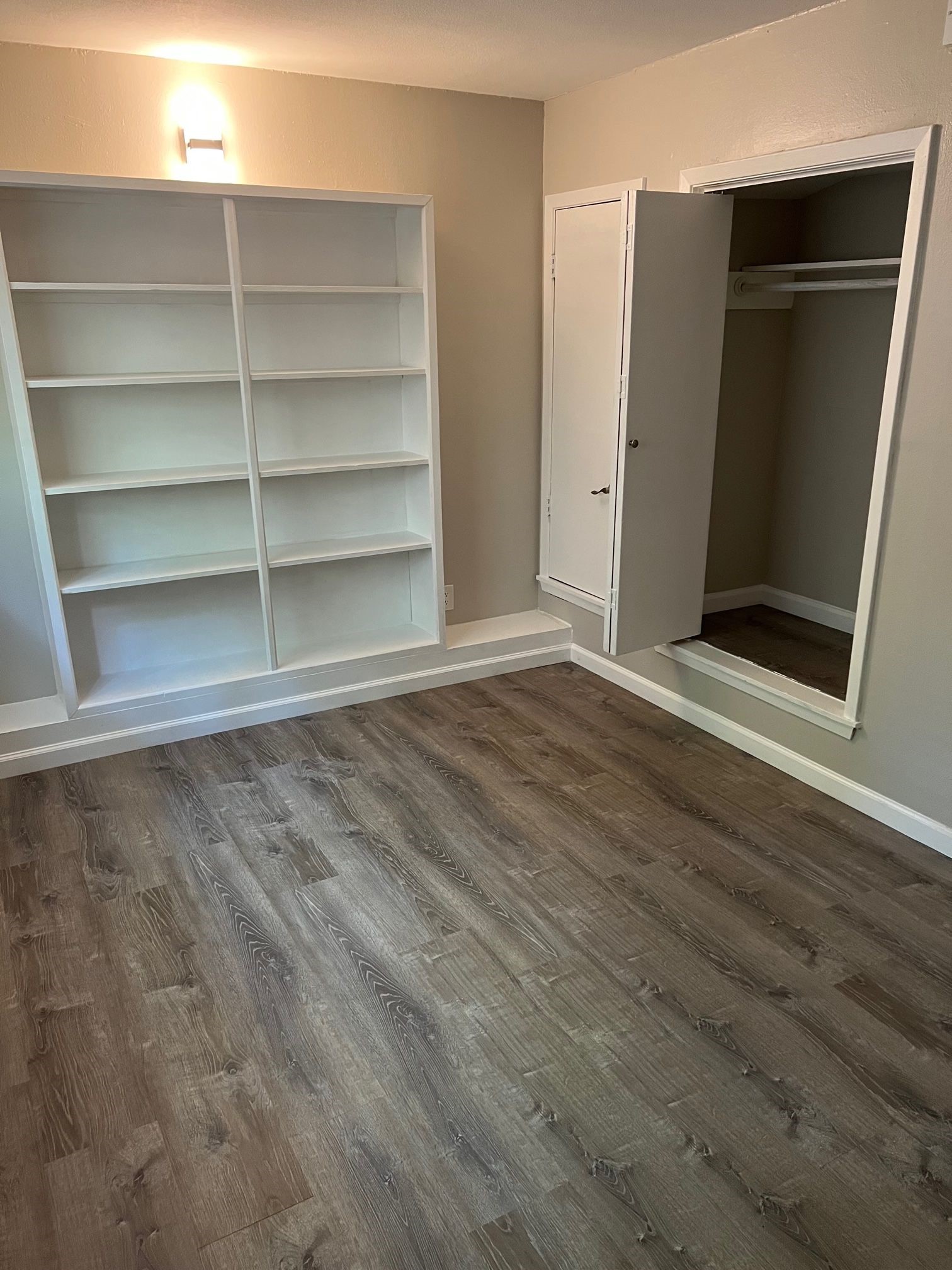2413 Leon Street, Unit 103 Austin, TX 78705 - Photo 15 of 15 a view of an empty room with empty shelves
