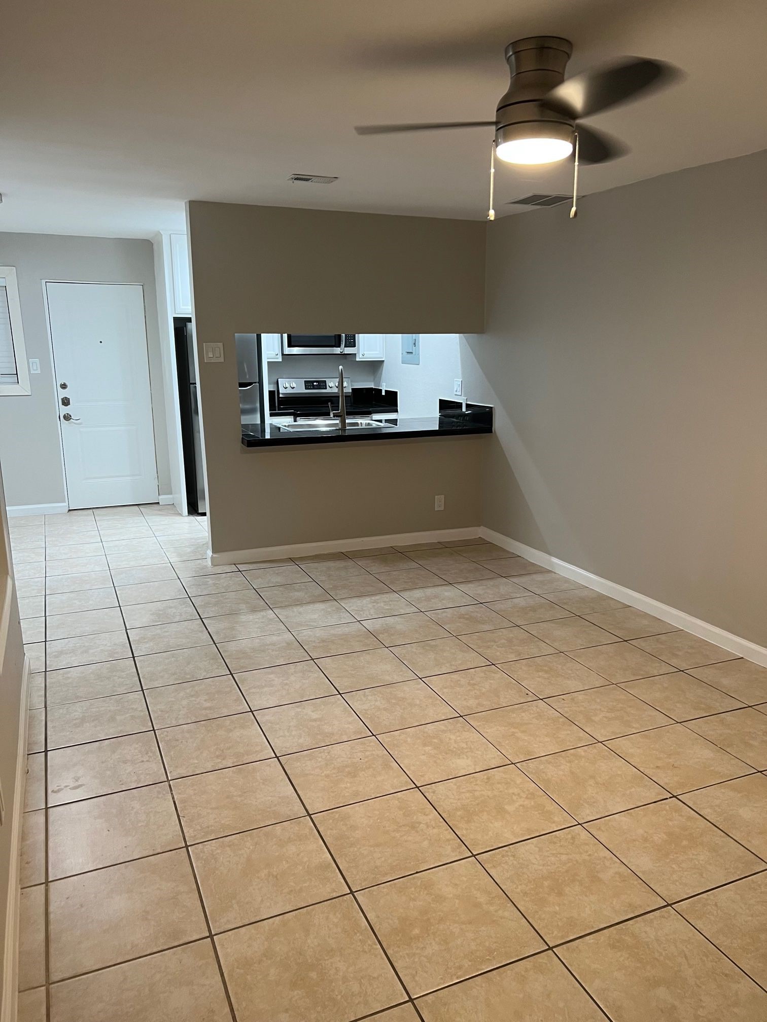 2413 Leon Street, Unit 103 Austin, TX 78705 - Photo 2 of 15 a view of a kitchen with a sink