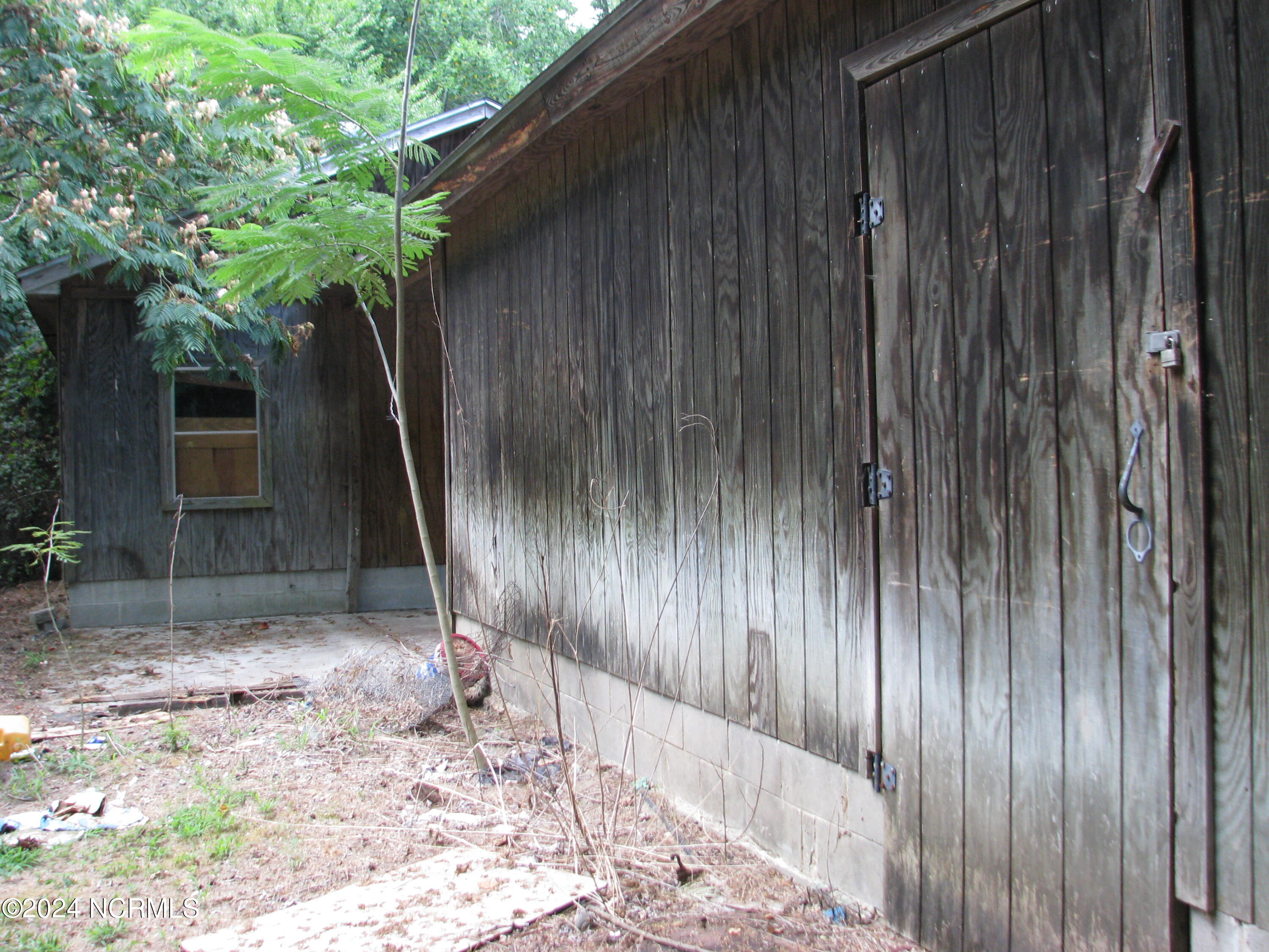 313 Golf Road Plymouth, NC 27962 - Photo 20 of 23 Back view of the left side storage building