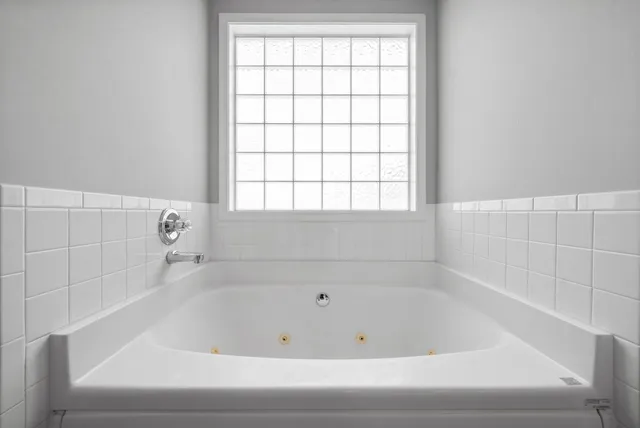 a bathroom with a bathtub