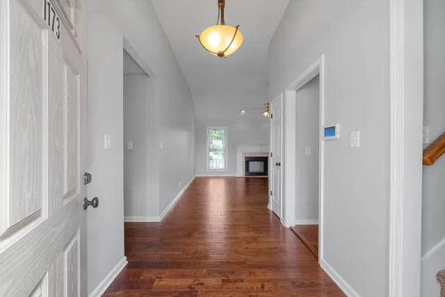a view of entryway with wooden floor